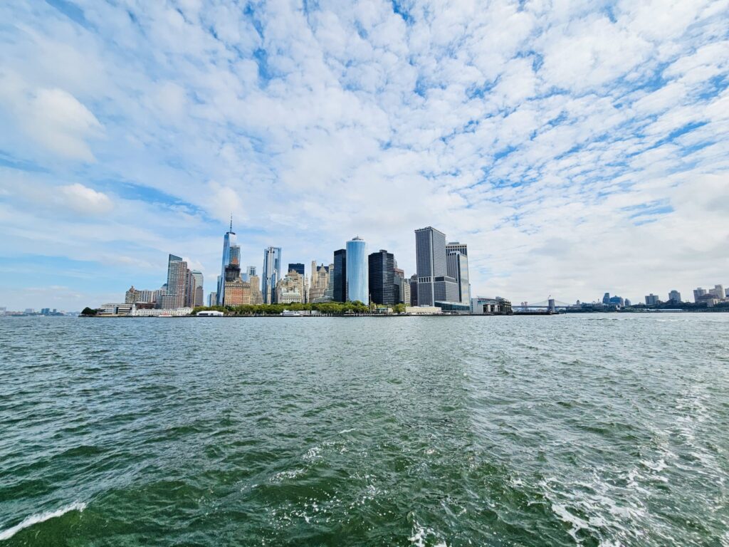 Panoramic view of a modern city financial-district skyline under a clear sky